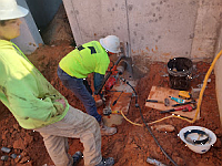 core drilling a concrete wall